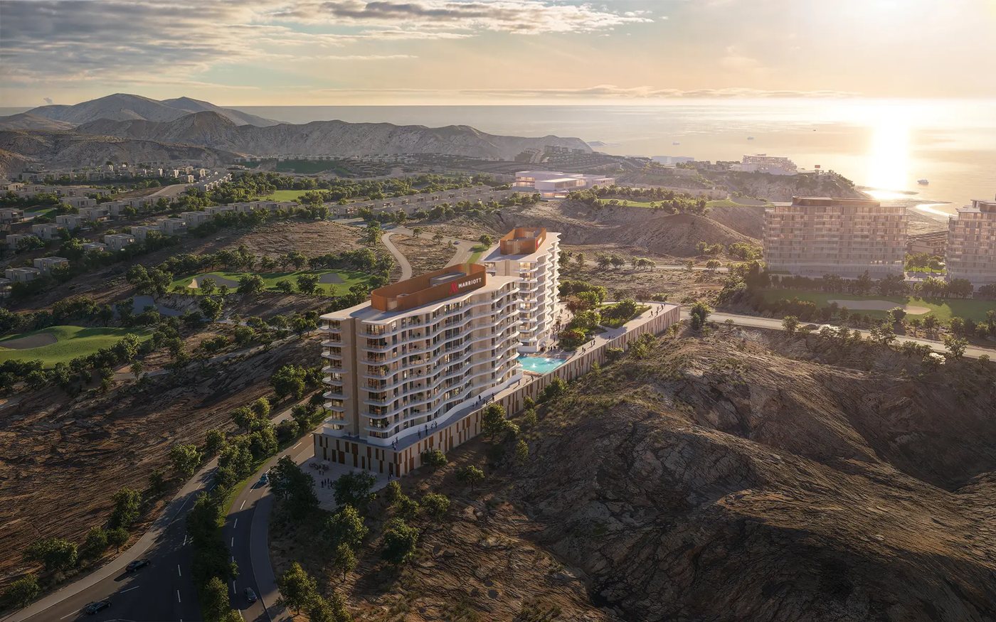 Aerial view of Marriott Residences AIDA above the golf course and the coast