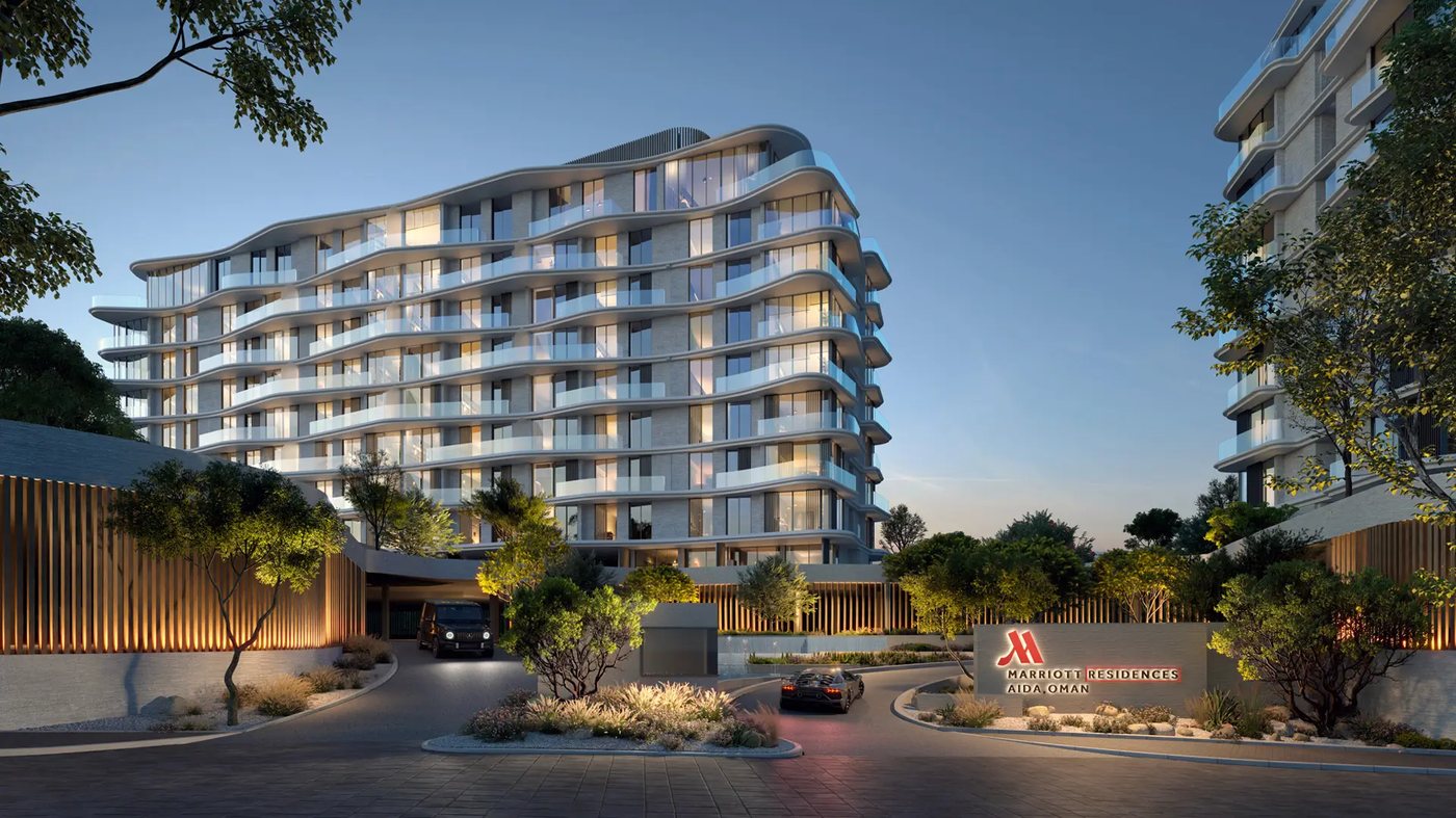Entrance and drop-off of Marriott Residences AIDA at dusk